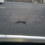 Pothole at 2915 Euclid Ave