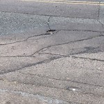Pothole at 10563 Greenford Dr
