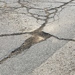 Pothole at 5421 Redland Dr