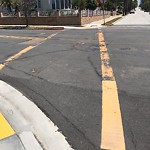 Faded striping at 5364–5376 Adams Ave