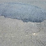 Pothole at 5840 Trojan Ave