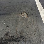 Pothole at 1897–1987 Commercial St